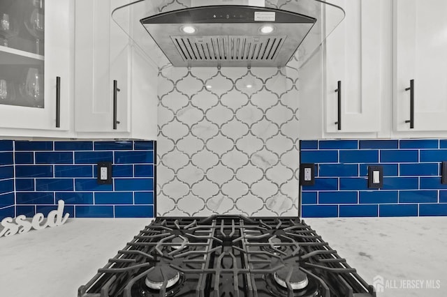 77 Winthrop Rd Unit C, Monroe Township, NJ 08331 - kitchen featuring under cabinet range hood, white cabinetry, glass insert cabinets, and gas stovetop