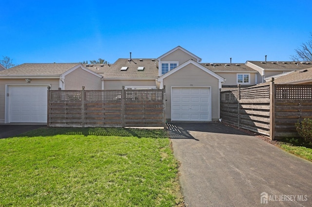 77 Winthrop Rd Unit C, Monroe Township, NJ 08331 - garage featuring fence and aphalt driveway