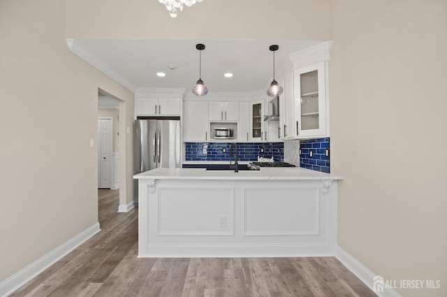 77 Winthrop Rd Unit C, Monroe Township, NJ 08331 - kitchen with glass insert cabinets, baseboards, stainless steel appliances, and white cabinetry