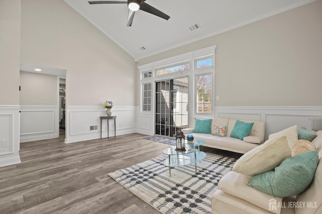 77 Winthrop Rd Unit C, Monroe Township, NJ 08331 - living room featuring a ceiling fan, visible vents, ornamental molding, and a wainscoted wall