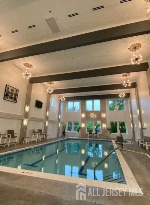 77 Winthrop Rd Unit C, Monroe Township, NJ 08331 - pool featuring a notable chandelier
