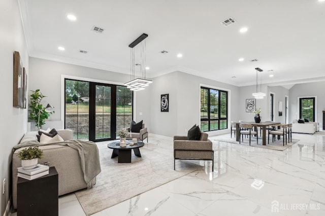 living room with french doors and ornamental molding