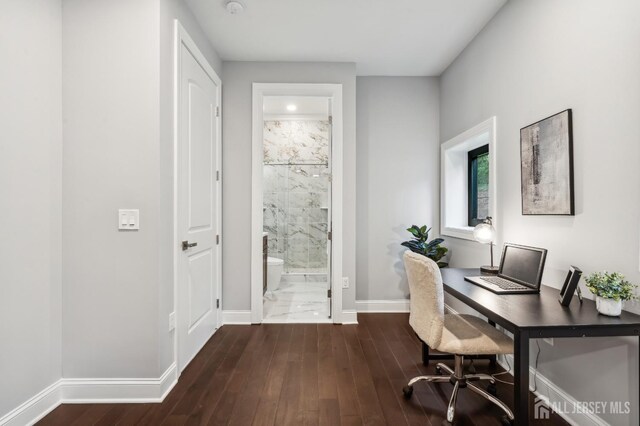 home office featuring dark hardwood / wood-style flooring