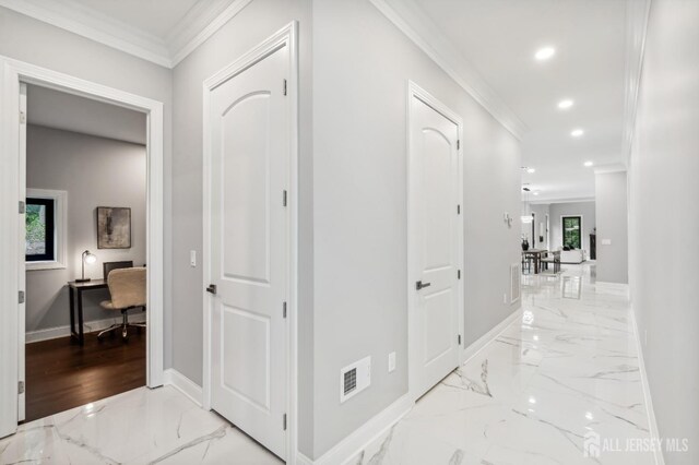 hallway with crown molding