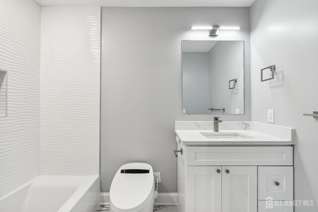 full bathroom featuring shower / washtub combination, vanity, and toilet