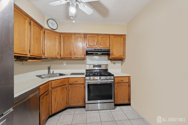 160 Goldmine Ln, Old Bridge, NJ 08857 - kitchen featuring appliances with stainless steel finishes, under cabinet range hood, ceiling fan, light tile patterned floors, and light countertops
