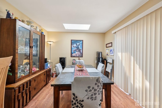 160 Goldmine Ln, Old Bridge, NJ 08857 - dining area with light wood-style flooring and a skylight
