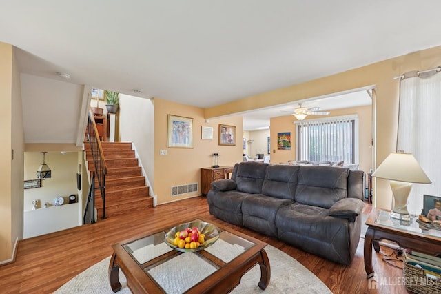160 Goldmine Ln, Old Bridge, NJ 08857 - living area featuring wood finished floors, stairs, and ceiling fan