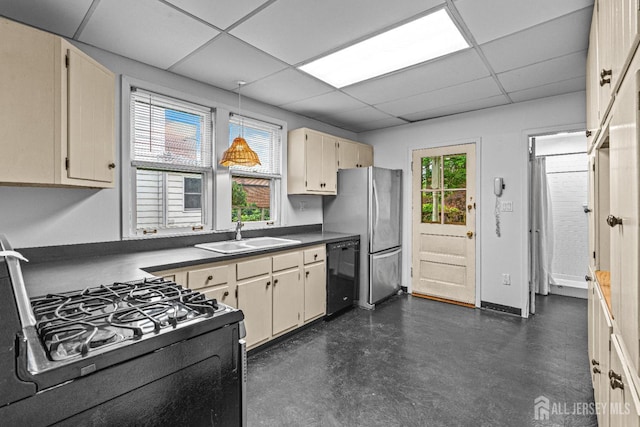 110 N 5th Ave N, Highland Park, NJ 08904 - kitchen with range with gas stovetop, a sink, black dishwasher, a paneled ceiling, and dark countertops