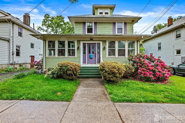 110 N 5th Ave N, Highland Park, NJ 08904 - american foursquare style home with a front lawn