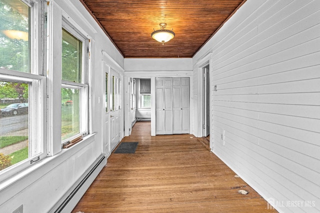 110 N 5th Ave N, Highland Park, NJ 08904 - hallway with a baseboard radiator, wood finished floors, crown molding, and wood ceiling