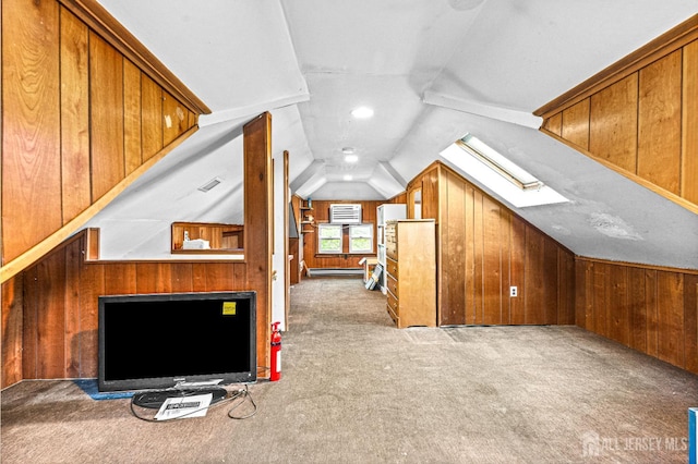 110 N 5th Ave N, Highland Park, NJ 08904 - additional living space featuring carpet, lofted ceiling, wood walls, and a skylight
