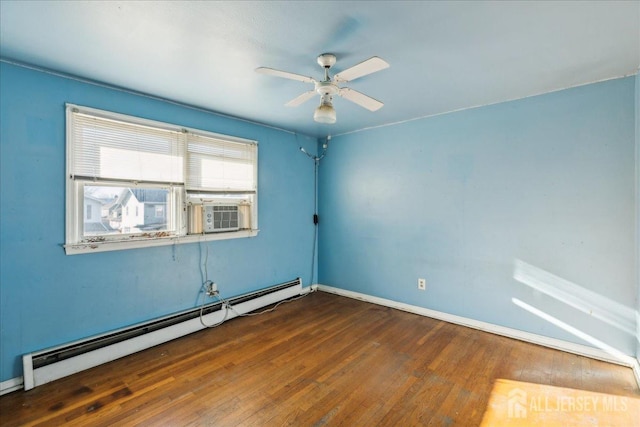 empty room with a baseboard heating unit, ceiling fan, cooling unit, and dark hardwood / wood-style flooring