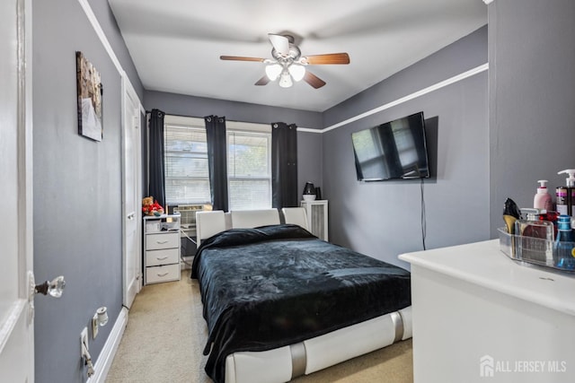 263 Bordentown Ave, South Amboy, NJ 08879 - bedroom featuring light colored carpet and ceiling fan