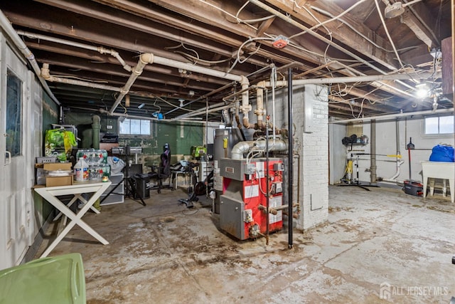 263 Bordentown Ave, South Amboy, NJ 08879 - basement with gas water heater and a heating unit