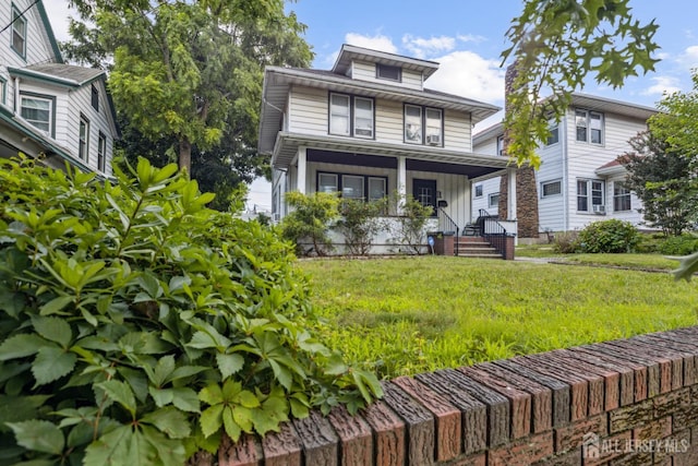 263 Bordentown Ave, South Amboy, NJ 08879 - american foursquare style home with a porch, board and batten siding, and a front yard