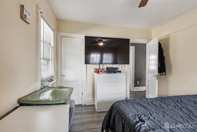 263 Bordentown Ave, South Amboy, NJ 08879 - bedroom featuring wood finished floors, cooling unit, and ceiling fan