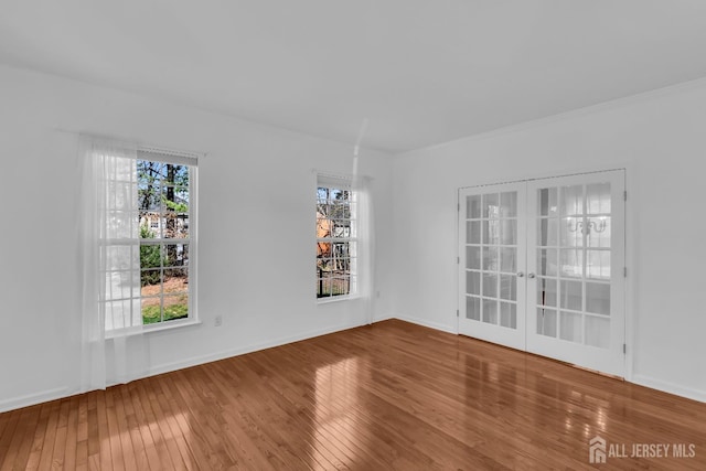 4 Angelina Ct, Monroe, NJ 08831 - empty room featuring hardwood / wood-style floors, french doors, and baseboards