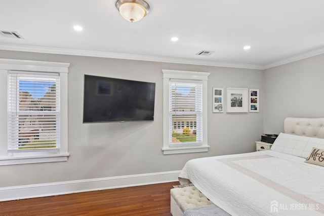 147 Grove Ave, Woodbridge Proper, NJ 07095 - bedroom with wood finished floors, multiple windows, ornamental molding, and recessed lighting