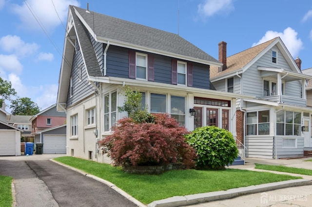 147 Grove Ave, Woodbridge Proper, NJ 07095 - view of front of house featuring a garage, a shingled roof, a chimney, and a front lawn