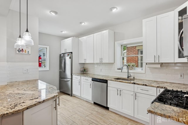 147 Grove Ave, Woodbridge Proper, NJ 07095 - kitchen with stainless steel appliances, tasteful backsplash, light stone countertops, and recessed lighting