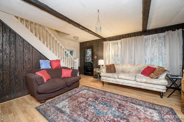 45 Lake Ave, Helmetta, NJ 08828 - living area featuring stairs, wood finished floors, and beam ceiling