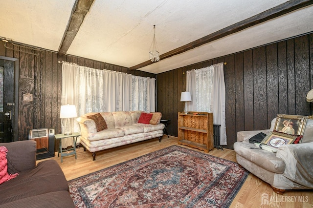 45 Lake Ave, Helmetta, NJ 08828 - living area with beamed ceiling, wooden walls, and wood finished floors