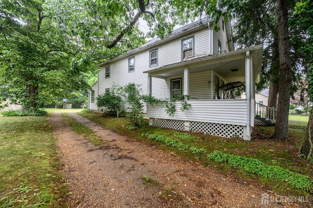 45 Lake Ave, Helmetta, NJ 08828 - view of home's exterior with a porch, driveway, and stairs