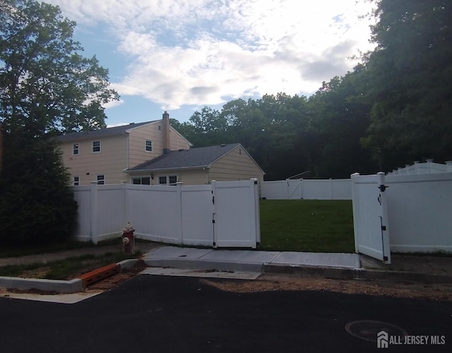 18 Timber Rd, East Brunswick, NJ 08816 - view of property exterior featuring a gate