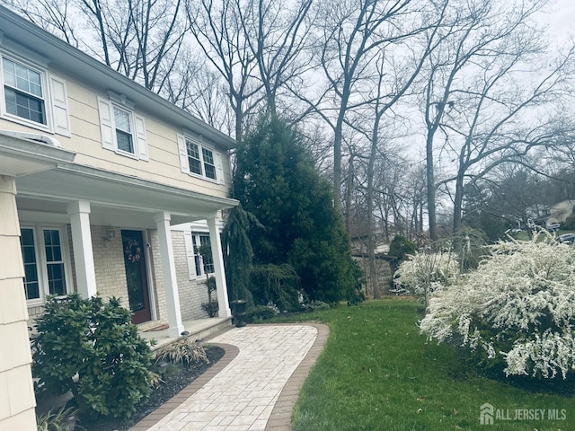18 Timber Rd, East Brunswick, NJ 08816 - view of grassy yard with a porch