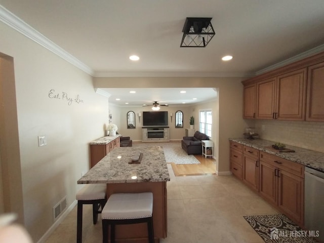 18 Timber Rd, East Brunswick, NJ 08816 - kitchen with dishwasher, a center island, crown molding, ceiling fan, and recessed lighting