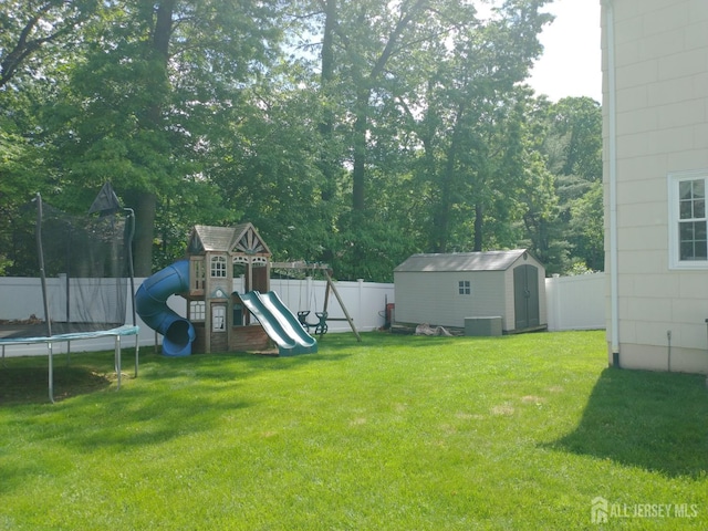 18 Timber Rd, East Brunswick, NJ 08816 - view of yard with a trampoline, a playground, and cooling unit