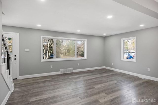 empty room featuring dark hardwood / wood-style floors