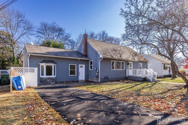 view of front of home with a front yard