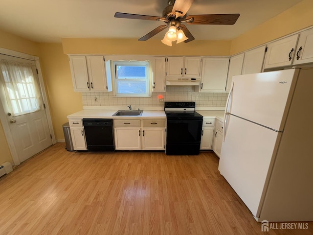 kitchen featuring black appliances, ceiling fan, white cabinets, and sink