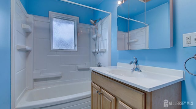 bathroom with washtub / shower combination and vanity