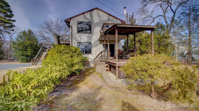 view of front of property with stairs