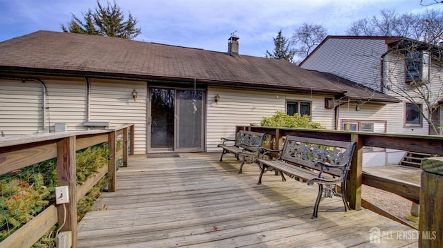 rear view of house with a deck