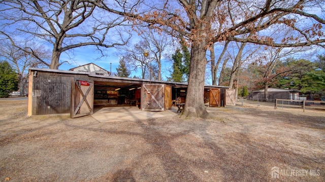 view of outbuilding with an outbuilding