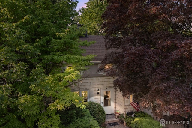 22 S Drive E, Brunswick, NJ 08816 - view of front of home with a shingled roof
