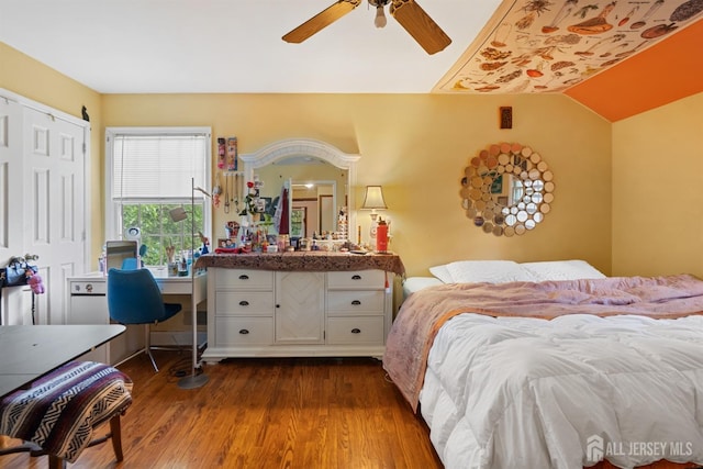 22 S Drive E, Brunswick, NJ 08816 - bedroom with dark wood-style floors, a ceiling fan, lofted ceiling, a closet, and a desk