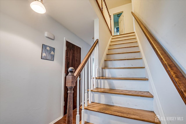 10 Ginesi Ct, Metuchen, NJ 08840 - staircase with wood finished floors and baseboards