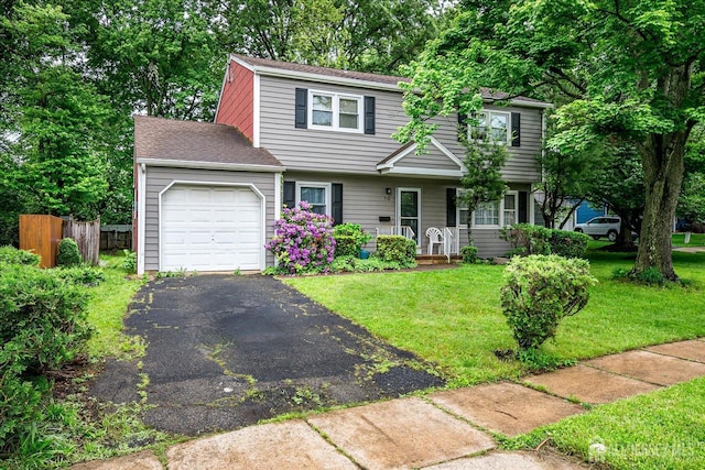 10 Ginesi Ct, Metuchen, NJ 08840 - colonial house with a garage, asphalt driveway, and a shingled roof