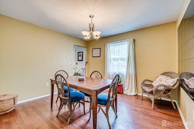 10 Ginesi Ct, Metuchen, NJ 08840 - dining room with a chandelier and light wood-style floors