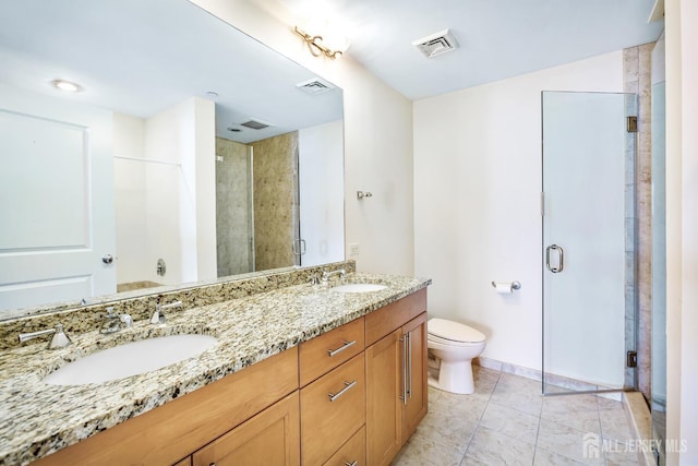 20 Livingston Ave Unit 504, New Brunswick, NJ 08901 - bathroom featuring double vanity, a stall shower, and tile patterned floors