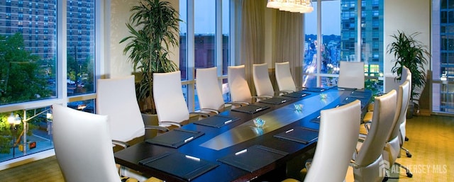 20 Livingston Ave Unit 504, New Brunswick, NJ 08901 - dining area featuring a city view and a chandelier