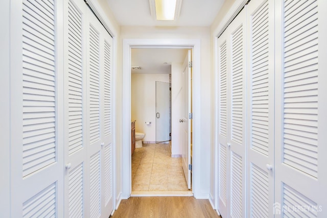 20 Livingston Ave Unit 504, New Brunswick, NJ 08901 - hall featuring baseboards and light wood-type flooring