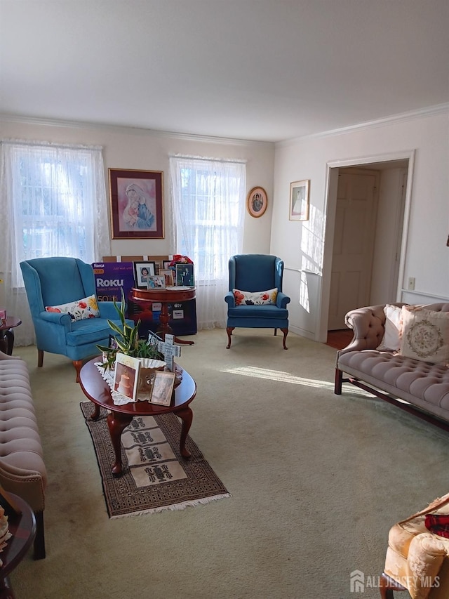 carpeted living room with crown molding