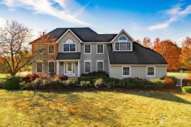 view of front of home featuring a front lawn