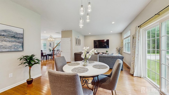 612 Magnolia Rd, North Brunswick, NJ 08902 - dining room with a chandelier, light wood-type flooring, baseboards, and recessed lighting